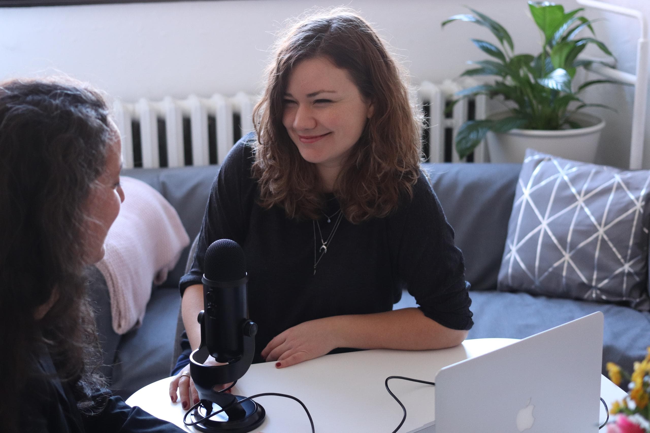 Two women podcasting